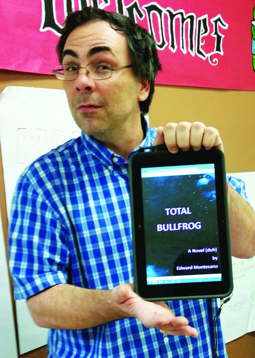 Montesano holding the digital copy of Total Bullfrog