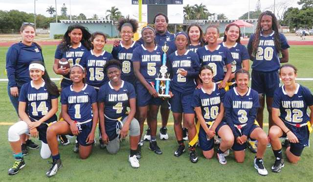 As+a+first+year+team%2C+the+Miami+Highs+girls+flag+football+team+won+the+district+and+GMAC+championships.