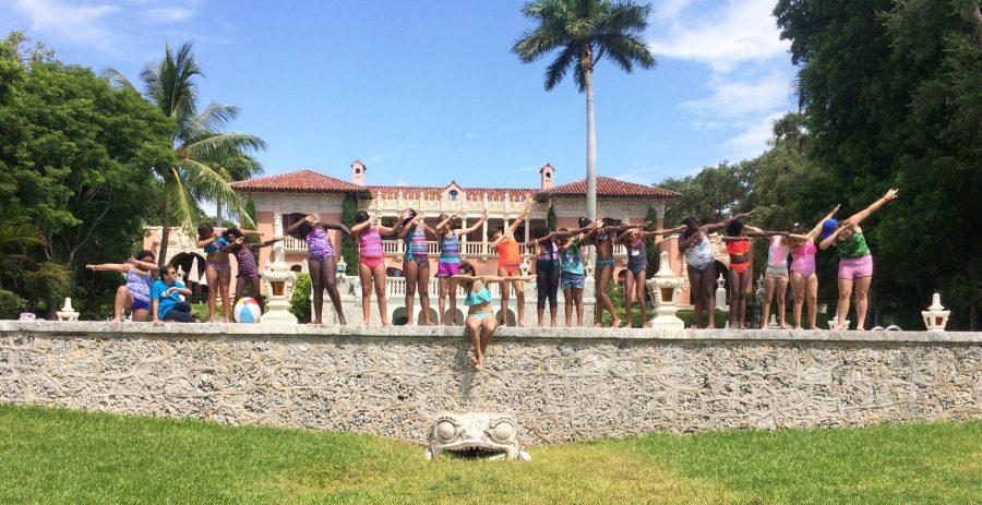 Soak up the sun! All the 5th Grade scholars and Ms. Danaize (center) celebrating the end of the summer by throwing a pool party.