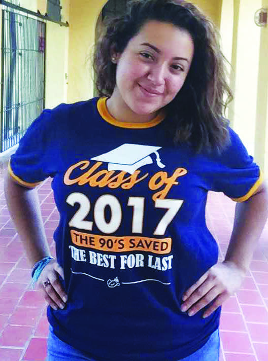 Senior Class Treasurer Karina Garcia showing off her new class shirt.