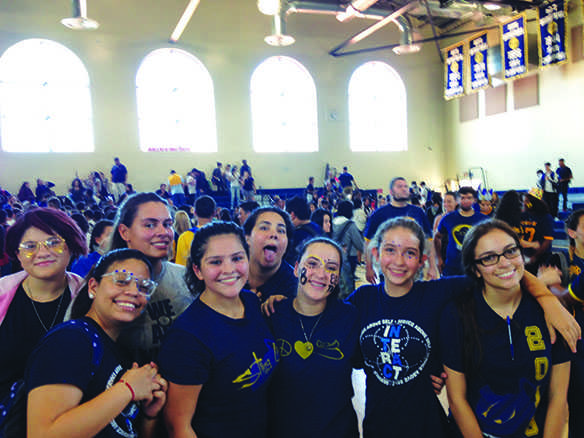 Juniors (from left to right) Kelen, Monica, Elizabeth, Ingrid, Adalain, Lucy, Britney, along with Ms. G participating in the Fall Pep Rally. 