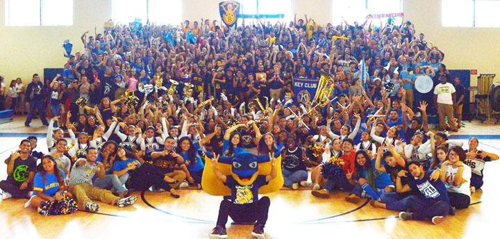 The 4 major clubs take a group picture with the cheerleaders, band, and the schools class and SGA officers during last years pep rally.