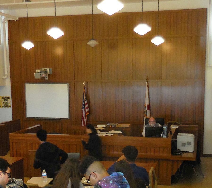 The courtroom-inspired classroom is sometimes used for mock trials.