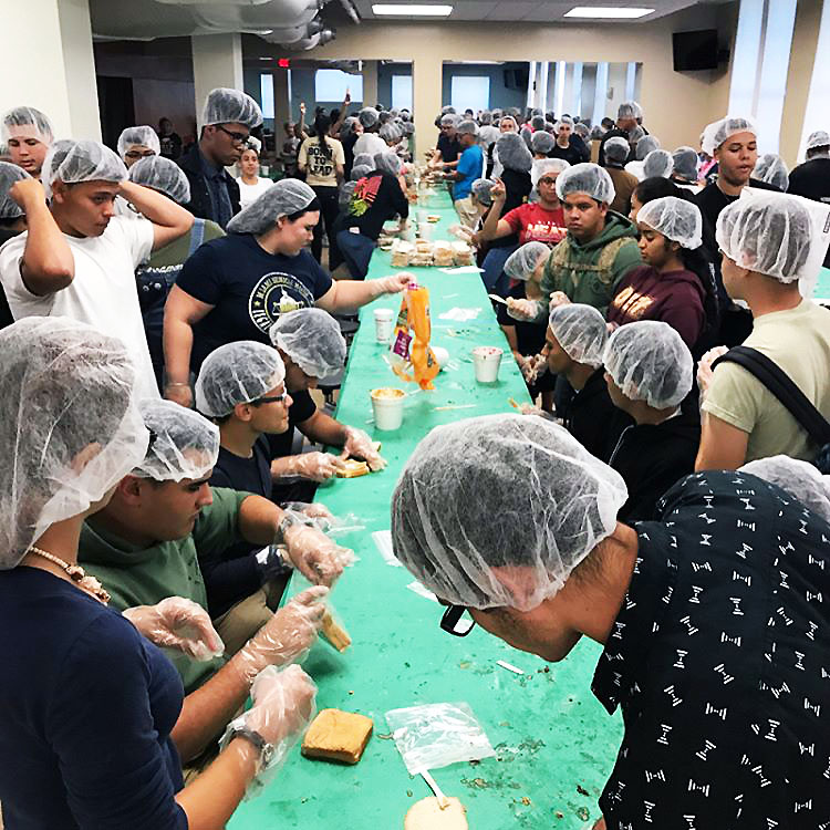 Over 250 students alongside faculty worked together to make nearly 3,000 sandwiches for the homeless.