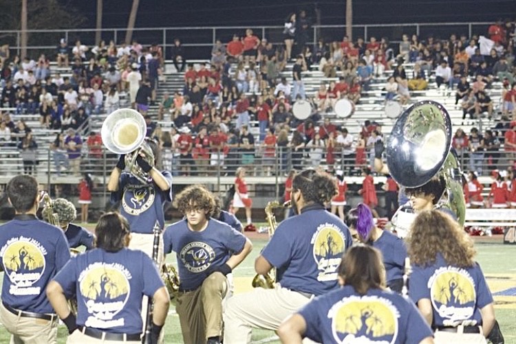 Million Dollar Band Members Preforming at a Sports Game (Taken from @stingareesband on Instagram)