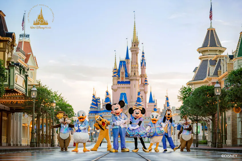The main characters of Disney pictured in front of Magic Kingdom.