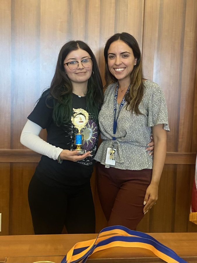 Junior Ashley Broche with Law Magnet teacher Ms. Perez in the Mock Trial competition