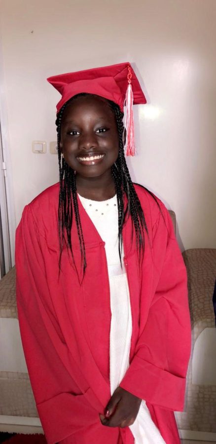 Seynabou at her middle school graduation.