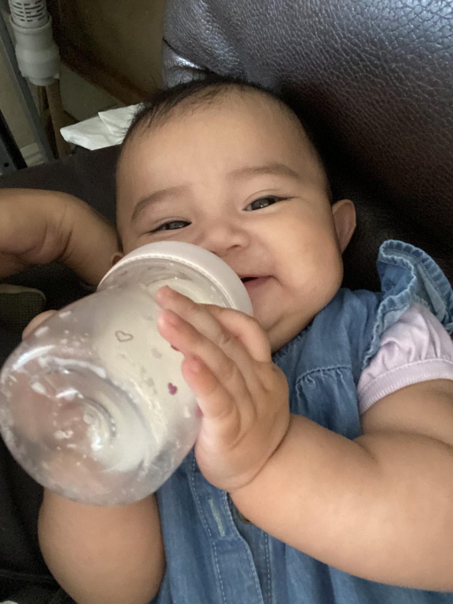 Her first time holding her bottle 