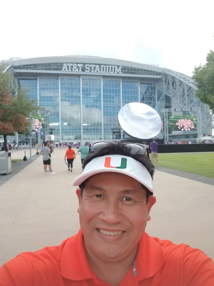 Mr. Nguyen at the AT&T Stadium, supporting the Miami Hurricanes at their football game
