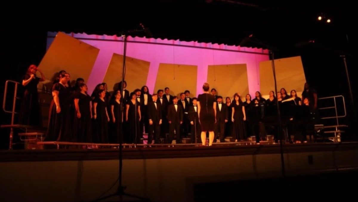 The Choir at their annual winter concert in the Miami Senior High Theatre.